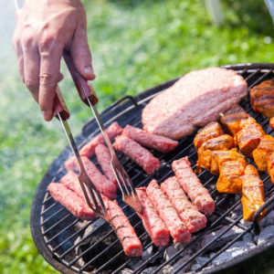 beef, pork, chicken, sausages on the grill