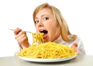 woman eating pasta