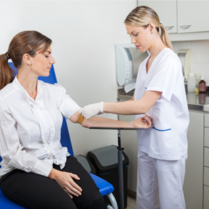 nurse drawing blood