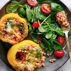 Plated, turkey stuffed peppers, couscous and mozzarella 