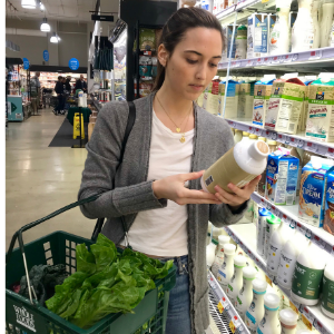 girl reading food labels
